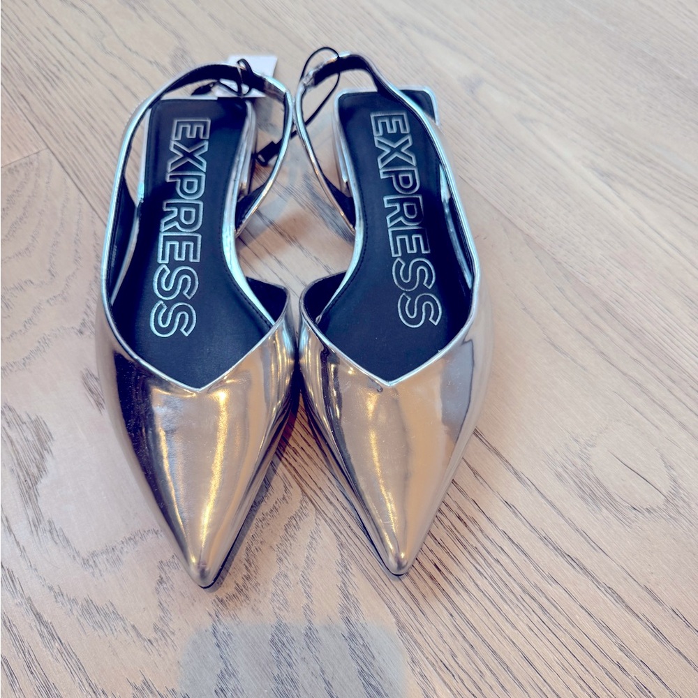 Silver pointed toe pumps